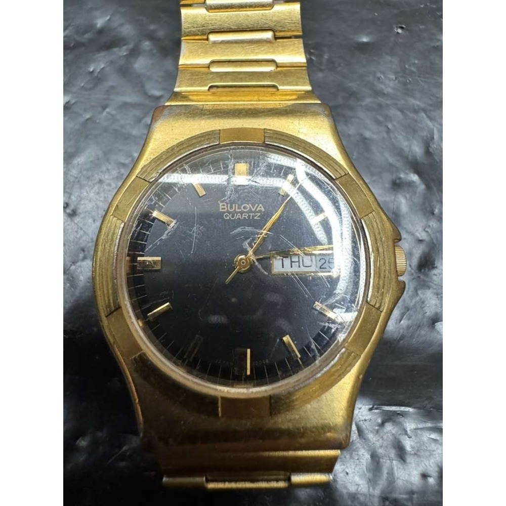 Vintage Bulova Gold-Tone Quartz Day-Date Black Dial Wristwatch H9081 Unisex